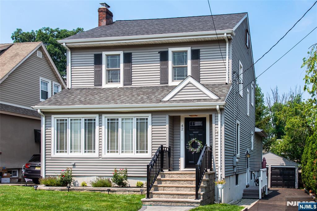 Look no further!This A+ Laning school district colonial will wow you on every angle! With gleaming redone hardwood floors,along with a cozy fireplace & molding & trim throughout, character & charm abound! All complemented by a spectacular updated kitchen/family room/full bathroom addition that boasts cherry wood cabinets,stainless steel appliances,granite countertops, & a breakfast bar-the perfect open floor plan for today's buyer! Three generous sized bedrooms and a recently redone full bathroom await you on second floor.Don't miss the third floor walk up attic for unlimited expansion possibilities!Enjoy coffee or cocktails on your trex deck or enclosed front porch.Full basement affords opportunities for playroom,rec room, exercise room, or office-your pick!Brand new lawn & two car garage.Fully insulated split units throughout the home for your comfort.Just a stone's throw to acclaimed Verona Park,restaurants,shops & NJ Transit bus.A hop,skip jump to all that Montclair has to offer-the Wellmont Theatre,Montclair Film Festival & S Mountain Art Museum.Be in for school to start if desired! This one won't last!