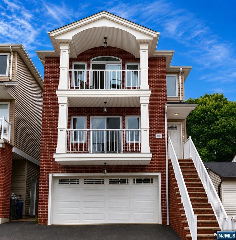 Welcome to this oversized extra wide 30x100 two family home built in 2017 with only the best materials by top lux builders. Featuring large rooms throughout, stainless steel appliances with granite countertops, same layout on each floor with 3bd/2bth in unit washer dryer, balcony perfect for a meadowlands sunset views, walk in closets, central AC/Heat 4 car garage parking with extra 2 outside. 1st floor is a duplex apartment with a large family room and half bath on the ground floor with a sliding door directly to the enclosed private back yard for entertaining and relaxing. The side of the building has a convenient nook for garbage bins so they are out of the way as well as a utility closet for supplies. Close to all major box stores and highways. Call today!!