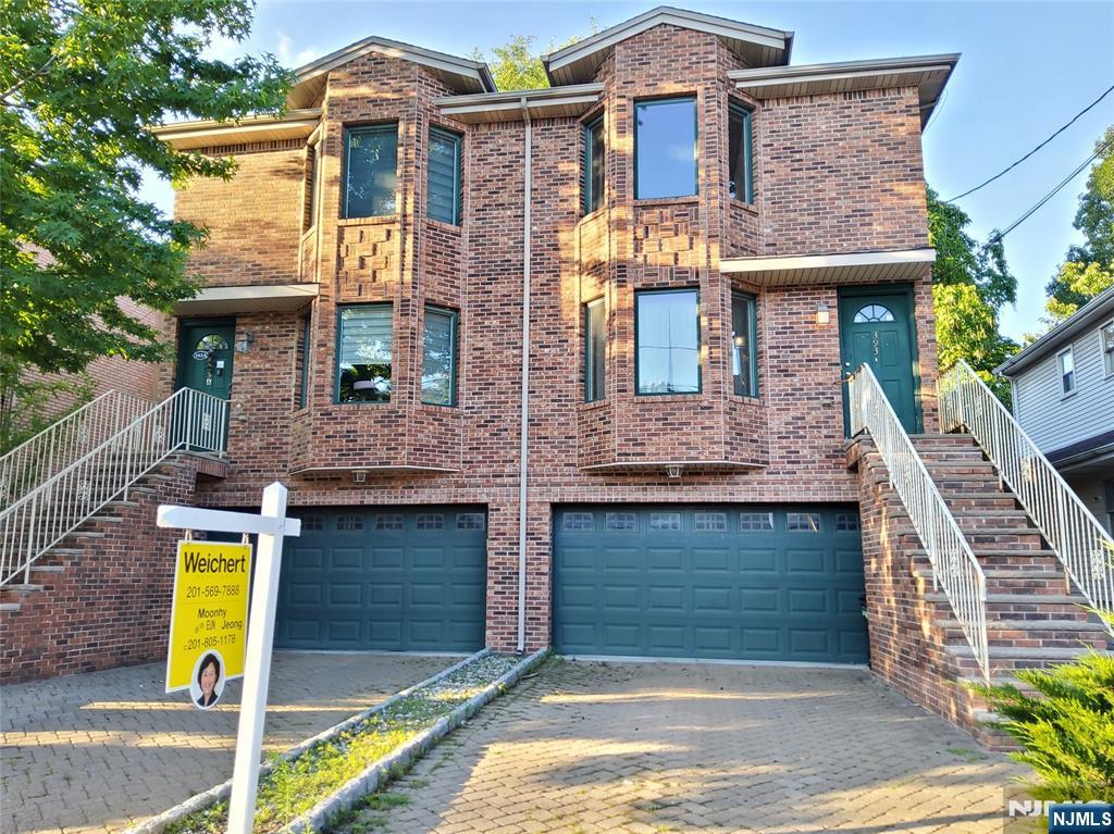 Large Brick Duplex on a quiet Residential Area, Unit is on Right Side, 3 Beds & 3.5 Baths, House facing South, Open Layout, Enjoy Bright & Airy Natural Light streams into Living Rm from morning to evening, Dining Area, Large Eat-in Kitchen opens to Deck, 1/2 Bath, Conveniently Located Laundry Rm on Main Level, 2nd Floor has Large Primary Bedrm w/Double Closets, Jaccuzzi in Primary Bath, Good Sized Bedrooms, Skylight, Ground Floor Family Rm has it's own Full Bath, Sliding Dr(Sep Entrance) to Private Backyard/Patio, Central AC, Central VAC, 2 Compact Car or One Car Oversized Garage w/Opener and Stone Paved Driveway, Convenient Location, Close to Shopping/ School and Bus to NYC.