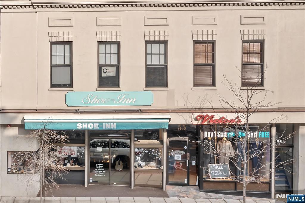 Discover an investment opportunity in the heart of Downtown Ridgewood! Well-maintained commercial building boasts high visibility and consistent foot traffic, making it an ideal location for retail and office use. Located just a block from NJ Transit buses and train station, accessibility is a major advantage for both tenants and customers. The building is 100% tenant-occupied, providing immediate rental income. Prime Location: Situated in a vibrant downtown area, surrounded by shops, restaurants, and amenities that attract visitors year-round. This offers the potential for long-term appreciation in a desirable market. Don't miss your chance to own a key piece of real estate in Ridgewood 1/F: Features two retail spaces with access to a large basement for storage. 2/F: Home to 15 office suites, complemented by two separate restrooms.
