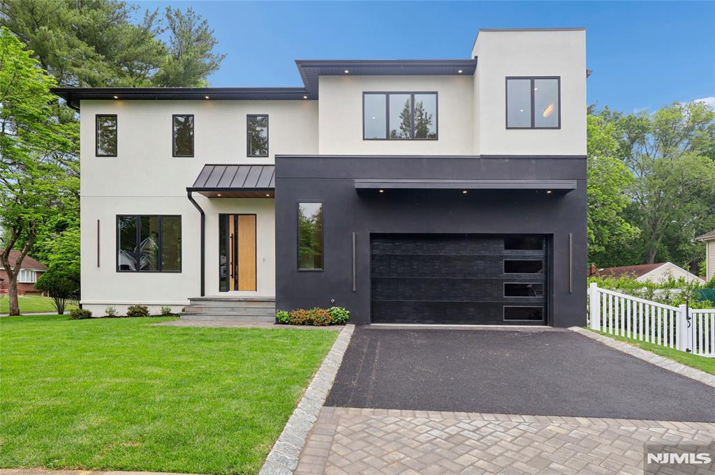 Welcome to this stunning new construction dream home in the heart of Cresskill, boasting 5 bedrooms and 4.5 baths with exceptional curb appeal and stunning finishes throughout. Beaming hardwood floors and abundant natural light flow throughout this open concept layout, thoughtfully designed for effortless living and entertaining. The gourmet kitchen showcases a striking center island, top-tier appliances, sleek modern finishes, and sliding doors leading to the private backyard oasis with a heated pool. Luxury continues with features that include a built-in sound system and heated bathroom floors, adding comfort and sophistication throughout the home. Upstairs, the expansive primary suite offers a spa-like bath and generous closet space, while all additional bedrooms and bathrooms continue the homeâ€™s elegant modern aesthetic with quality craftsmanship and ample storage. The finished basement provides endless possibilities for a home gym, recreation area, media lounge, or play space. Built on an existing foundation with all-new construction, this exceptional home is located in a sought-after community with award winning schools, convenient commute to NYC, and vibrant town amenities. A rare opportunity to own a home that perfectly blends luxury, comfort, and functionality â€” truly a must-see.