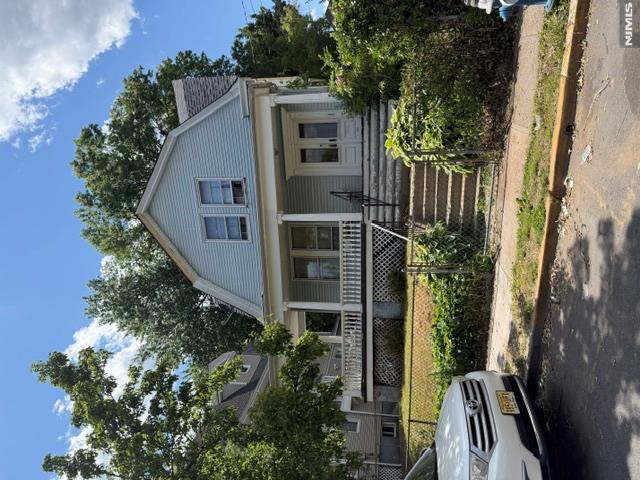 Charming Colonial featuring a welcoming wraparound porch, perfect for relaxing and entertaining. This home offers 4 bedrooms, 1 full bath, 1/2 Bath in basement w/shower hookup.A formal dining room, and an eat-in-kitchen with ample space for everyday living. Enjoy classic character and comfortable living areas throughout. Comveniently located near schools, shopping, parks and transportation. Sold "as is" buyer responsible for all repairs and city inspections and C/O fire inspections.