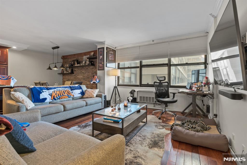 WITH AN ESTIMATED 1,097 SQFT,THIS 1 BEDROOM CONDO IN TOWER 2 OFFERS LUXURIOUS NEW YORK VIEWS AS THE SUN RISES AND SETS. IT OFFERS AN OPEN CONCEPT LIVING ROOM, DINING ROOM,, KITCHEN, AMPLE STORAGE SPACE, PRIMARY AND HALF BATHROOM AT YOUR ENTRANCE ALONG WITH NOT JUST AN ASSIGNED PARKING SPOT OPPORTUNITY, BUT AMMENITIES THAT INCLUDE A POOL, GYM, GAMING ROOM, DOOR MAN, CONFERENCE ROOM, ELEVATOR USE, BBQ AREA, YARD AREA TO JUST RELAX OUTSIDE AND CLOSE PROXIMITY TO ALL TRANSPORTATION , PARKS, AND RESTAURANTS. WHAT IS NOT TO LIKE, ALL YOU HAVE TO DO IS SCHEDULE AN APPOINTMENT NOW.