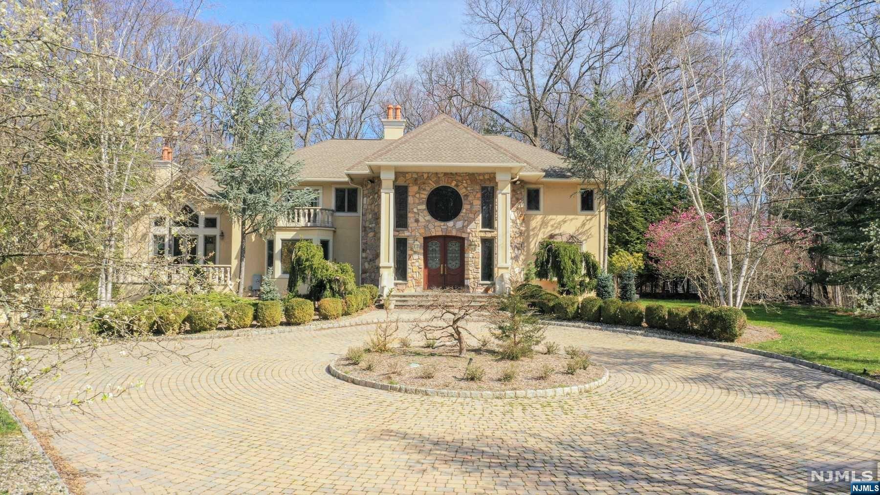 *BACK ON MARKET - BUYER COULD NOT PERFORM!* Welcome home to this spacious, 5 bedroom, 4 full and 2 half bath Colonial Manor situated on 2 acres. Enter to the 2-story foyer to find formal dining room, library/office, a first floor bedroom with full bath, and a great room with fireplace and large windows as well as access to the patio with inground pool and pool house. The Chef's eat-in kitchen includes center island, stainless steel appliances, separate breakfast area, and pantry closet. First floor also has a powder room. The second floor is complete with a primary suite with primary bath and large walk-in closet, 4 additional bedroom suites, 2 full baths and laundry room. Full, finished basement features large, open recreation area, storage room, a half bath, great for additional living space and entertaining. New roof - 2022. Also available for rent : $9700/month