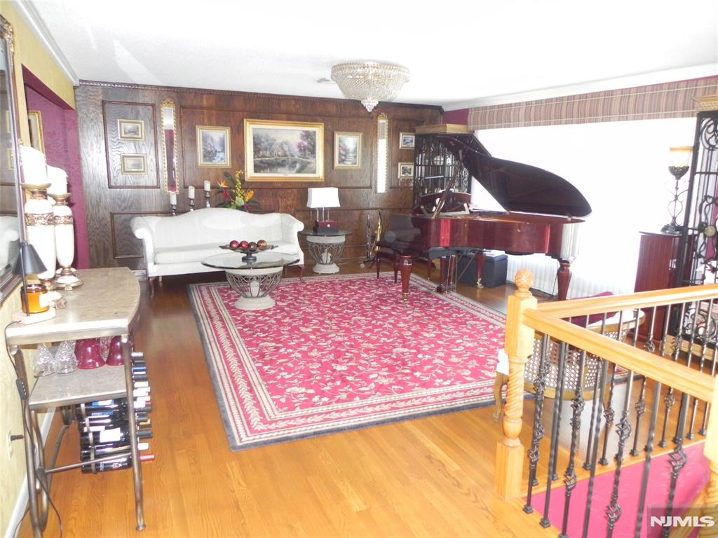 THIS BEAUTIFUL 4 BEDROOM 3 FULL BATH HOME IS LOCATED ON ONE OF THE PREMIER STREETS IN LITTLE FERRY. THE 1ST FLOOR FEATURES AN ENTRANCE FOYER, A BEAUTIFUL LIVING ROOM, FORMAL DINING AREA, A HUGE EAT IN KITCHEN WITH A BREAKFAST NOOK WITH VIEW OF THE BACKYARD AND IN-GROUND POOL AREA. THERE'S A SPACIOUS MASTER BEDROOM WITH A FULL BATH, 2 ADDITIONAL NICE SIZE BEDROOMS AND A FULL BATH #2. THE GROUND FLOOR FEATURES A LARGE FAMILY ROOM WITH A WOOD BURNING FIREPLACE, DINING AREA, ANOTHER BEDROOM #4, KITCHEN, A WET BAR, A LAUNDRY/UTILITY ROOM, FULL BATH, ENTRANCE TO THE GARAGE AND BACKYARD. THE BACKYARD HAS A BEAUTIFUL IN-GROUND POOL, OUTDOOR GRILLING STATION, A LARGE CABANA HOUSE AND A PUMP HOUSE. OTHER FEATURES OF THE HOME ARE CENTRAL A/C, SOLAR PANELS AND THE OUTSIDE OF THE HOME WAS PAINTED 1 YEAR AGO. CLOSE TO SCHOOLS, PARKS, SHOPPING AND NYC TRANSPORTATION.