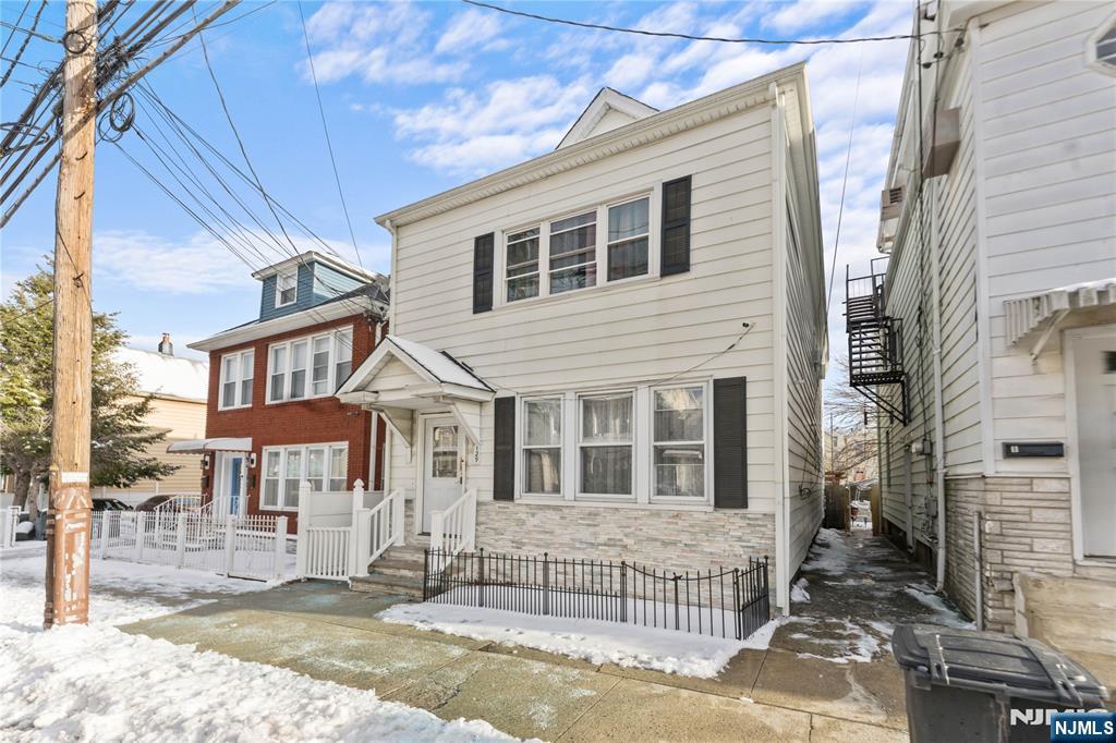 Recently renovated two-family property offering modern finishes & spacious layouts with great income potential. This 7-bedroom, 2.5-bathroom property is ideal for investors or owner occupant. Each unit boasts spacious bedrooms, sleek modern kitchens with stainless steel appliances, quartz countertops, and custom cabinetry. Open-concept living & Dining Areas flooded with natural light & perfect for entertaining! This property also features updated systems throughout such as electrical, plumbing, roofing & much more to ensure energy efficiency and peace of mind. Fully finished basement ideal for a home office, recreation or storage. The backyard offers privacy & is perfect for relaxation and summer gatherings. Conveniently situated near public transportation, major highways, shopping, and dining! Whether you're looking for a turnkey investment property or a place to call home while generating rental income, this property offers the best of both worlds!