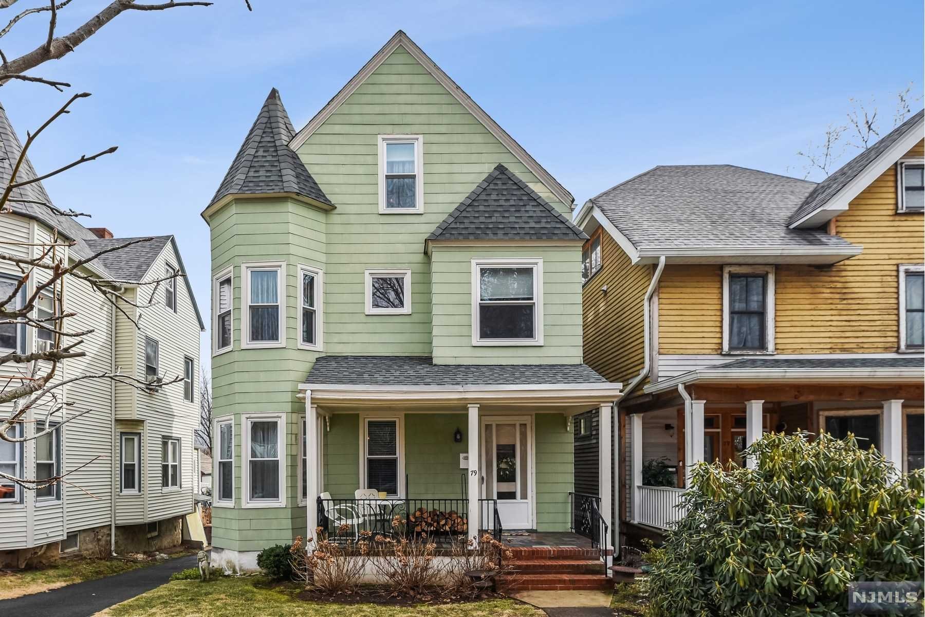 Montclair's finest at the door steps of this classic Queen Anne Victorian featuring 4-5 bedrooms, 2.2 baths, deep property(shared driveway) and two garages. Enjoy amazing restaurants, Walnut St train station, farmers market & cafes/pubs two blocks away. Admire the home's stunning architecture, high ceilings & new tall windows, gleaming hardwood floors and the glow of the wood burning fireplace in the living room (or could be dining room) and the stylist bedrooms including the 3rd fl Primary Suite with space to hangout. An open front porch and the back yard raised patio is great for outdoor enjoyment. Just a wonderful place to live! Extra property behind two garages too.