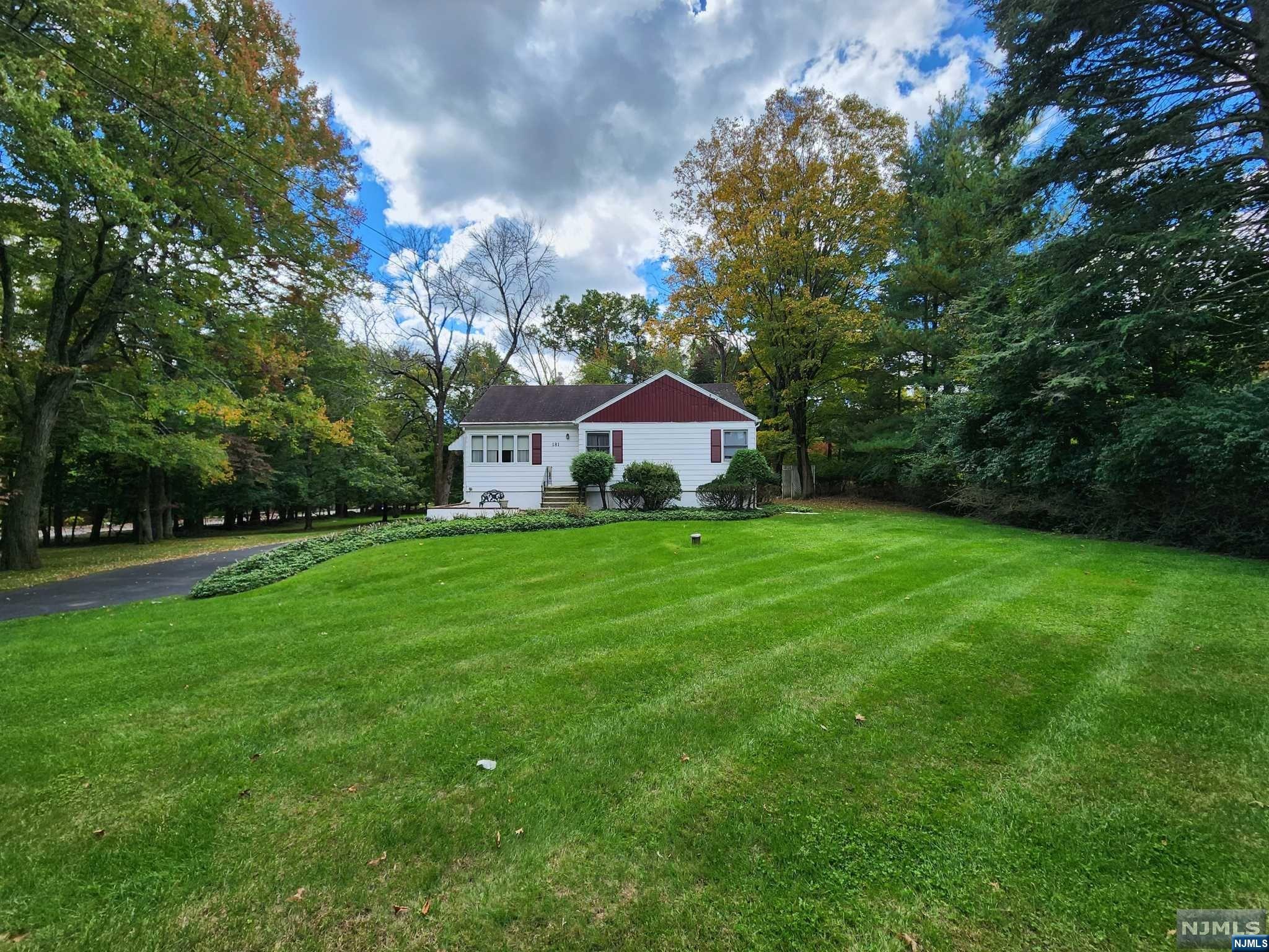 First time offered for sale by its original owner, this 2BR ranch is perfectly poised on a beautiful 1.08 acre lot. Excellent opportunity to renovate, expand or build anew. One-floor living includes a large living room that flows into the dining room, 2BRs and full bath. There is a screened porch off the kitchen that overlooks the lovely, private property. Being sold as is.