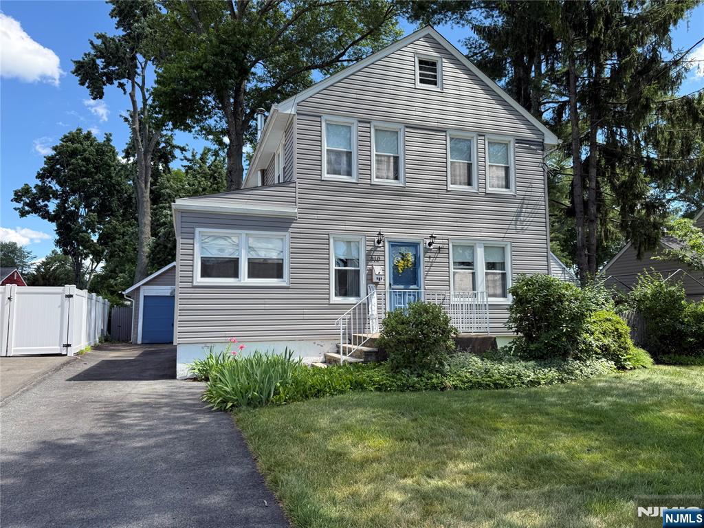 Welcome to this cute and cozy 3 bedroom, 1 1/2 bath Colonia located in beautiful Pompton Lakes! Fantastic opportunity for first-time homebuyers. This charming home offers a warm and inviting layout, perfect for comfortable everyday living. The first floor features a formal living room, dedicate office space, formal dining room, eat-in kitchen, and a convenient powder room. The kitchen offers direct access to a spacious deck, overlooking a beautifully manicured and manageable backyard, ideal for relaxing, entertaining, or enjoying outdoor gatherings. The second level features three bedrooms and a full bathroom. A partially finished basement provides plenty of storage space and includes a laundry area for added convenience. Additional highlights include hardwood floors, center air conditioning, a whole house generator, and a detached one car garage. Conveniently located near shopping, restaurants & major highways.