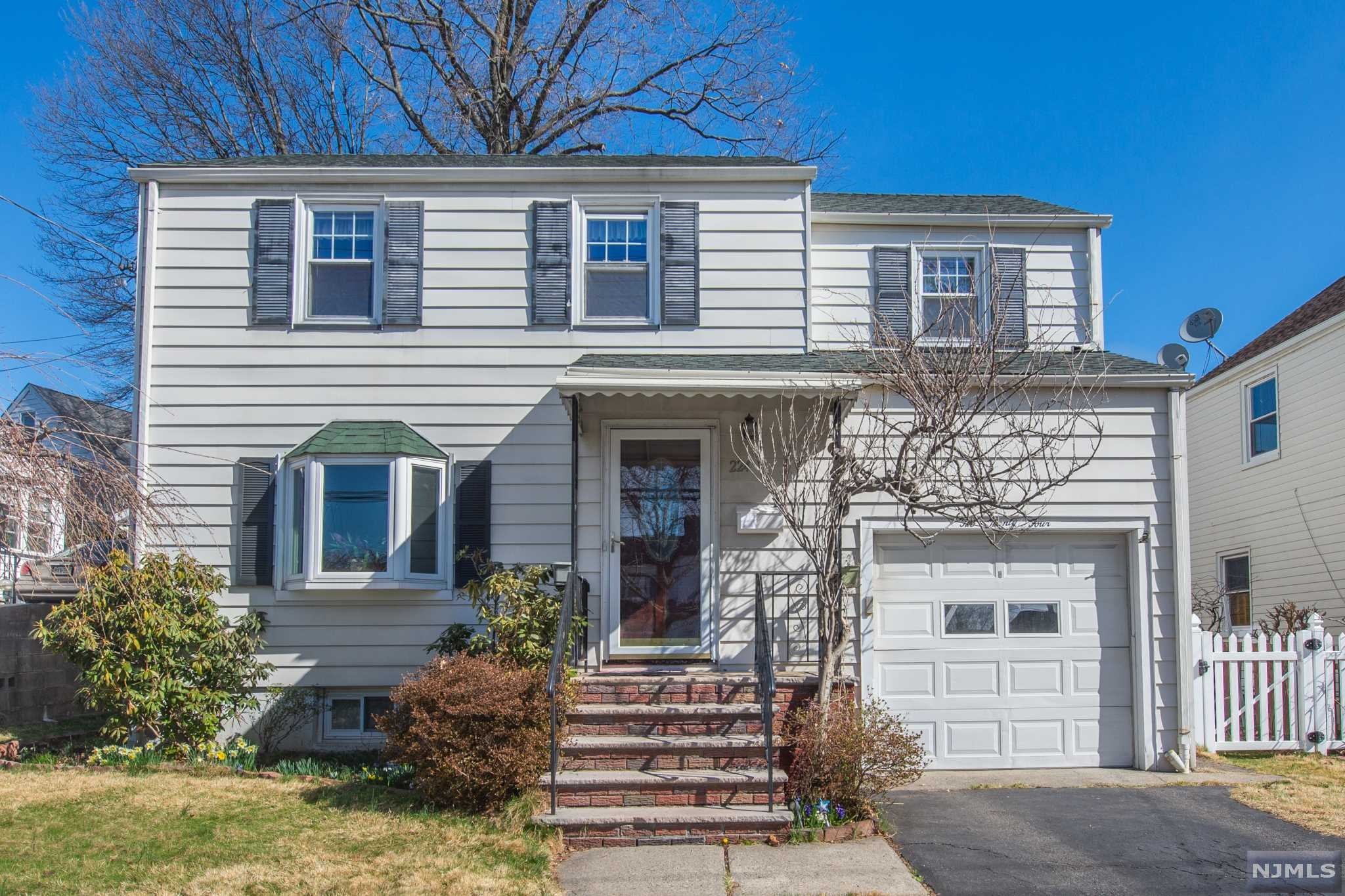 Nestled in a quiet neighborhood, this expanded colonial will WOW you with space & meticulous care. Entry vestibule leads to LR with hw floors underneath carpet. Sunlit bay window lights up the LR & adjacent formal DR. Rear of home has bump-out addition w/sitting room & nicely designed kitchen. Cooks will love the double ovens, upgraded cabinetry with loads of pot/pan drawers & accented glass cabinetry. The smartly designed peninsula adds cabinetry & counter space and creates an open feel. Sitting area features oversized picture window highlighting the private backyard & patio. The bsmt is full ceiling height; can be customized to the next buyers' preferences & features full bath w/jetted tub. The 2nd fl has 3 generously sized BRs. Updates include NEW Roof, NEW CAC & NEW HW Heater. Both Fridges & gas Dryer are incl, Washing Machine excl. Close to NY Bus, Garden State Pkwy, & is close to all restaurants downtown Bloomfield and Montclair have to offer.