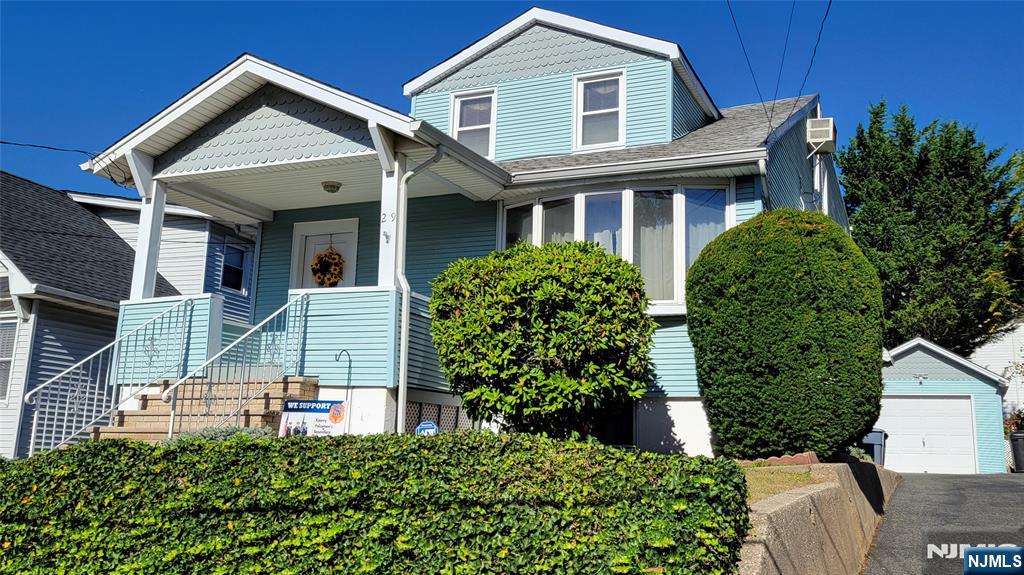 Exceptional, move in condition 2 Family home in the Roosevelt School district. This home contains 2 bedrooms on each floor and a partially finished basement. All utilities are separate and a long driveway and detached garage complete the package. Do not buy until you see this one!