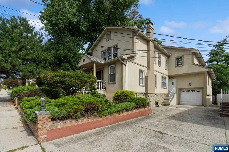 THIS UNIQUE 4 BR 4.5 BATH HOME HAS BEEN MAINTAINED AND RENOVATED OVER THE YEARS BY CURRENT OWNERS. SUN-FILLED, LARGE LIVING ROOM HAS WOOD-BURNING FIREPLACE, WHICH LEADS YOU TO FORMAL DINING ROOM AREA. SPACIOUS MODERN KITCHEN WITH GRANITE COUNTERTOPS AND SPLASHBACKS, STAINLESS STEEL APPLIANCES, AND BREAKFAST NOOK. PARALLEL TO THE KITCHEN IS A VERY GENEROUSLY SIZED FAMILY ROOM THAT IS PERFECT FOR ENTERTAINMENT WHICH HAS SLIDING DOORS TO DECK AND PATIO. 2ND FL CAN BE ACCESSED FROM FRONT AND BACK STAIRS. AS SOON AS YOU ENTER THE 2ND FL, THERE IS A NICE SITTING AREA. PRIMARY BR WITH MANY WINDOWS, HIGH CEILINGS, AND LARGE CLOSETS. TILED PRIMARY BATH HAS JACUZZI, STALL SHOWER, AND PLENTY OF ROOM FOR YOUR NEEDS. ADDITIONAL 2 BR THAT HAVE ACCESS TO HALLWAY BATHROOM, AND ANOTHER PRIMARY BR WITH FULL BATH. HOME HAS PLENTY OF CLOSET SPACE, 2 ZONE CENTRAL AIR, FORCED HOT AIR, HARDWOOD FL THROUGHOUT, FINISHED BASEMENT WITH FULL BATH, \ PARKING SPACE, GREAT LOCATION, NY TRANSPORTATION NEARBY.