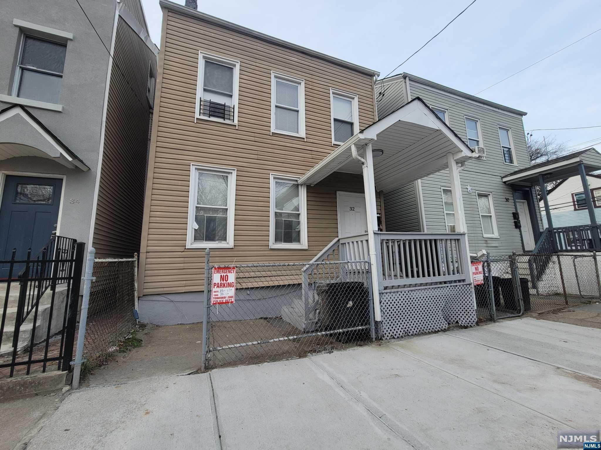 Two family home available for a great price! First floor unit offers kitchen, living room, two bedrooms, full bath and access to backyard. The renovated second floor unit is ready for the owner occupant and offers a kitchen, living room, 1 bedroom, full bath, back door for backyard access on second level and a third level with 3 additional bedrooms. Home is to be sold with current tenancy in place. Lender may require flood insurance. FHA offers welcomed.