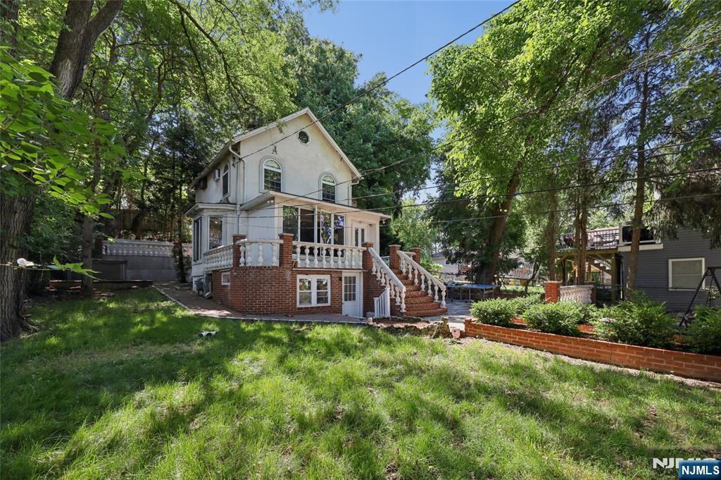 This house has open living concept on the main level with living room, dining room and kitchen. The second floor has 3 bedrooms and 2 full bathrooms. The basement level is walk in and out and has a mud room area, rec room, storage and laundry as well as a bonus bathroom. Many outdoor areas for enjoyment.