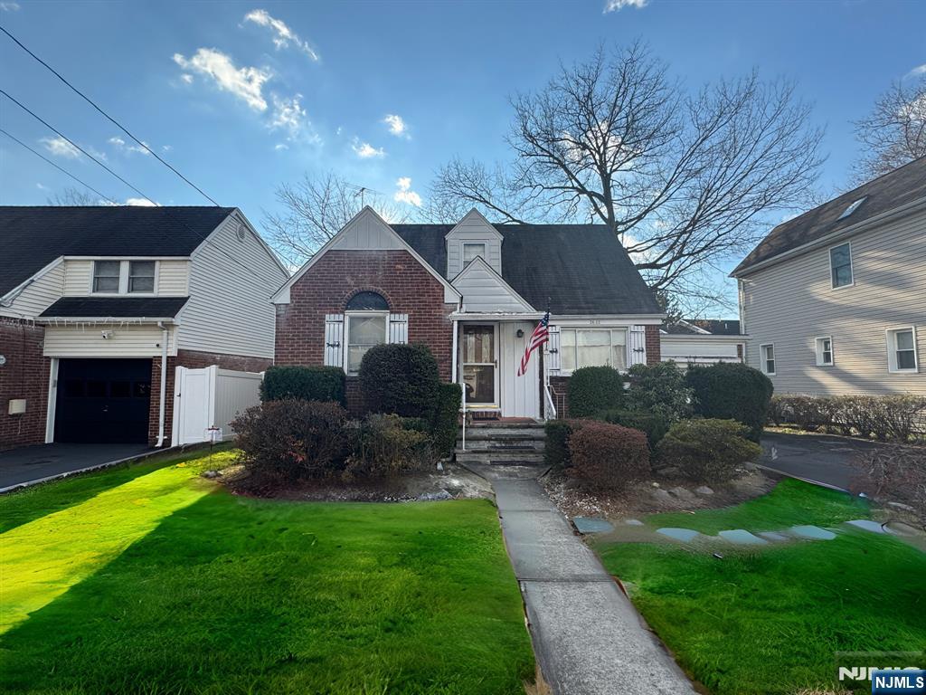 Discover the potential in this charming Cape Cod home featuring 3 bedrooms, 1 bath, and a layout perfect for creating your dream space. A sun- filled living room and dining room opens to a cozy sun porch, leading to a backyard. Just minutes from public transportation, shopping, and major highways!. A fantastic opportunity to bring your vision to life and make this house your own. Additional features include a one car garage and central air conditioning. Don't miss the chance to unlock its full potential!