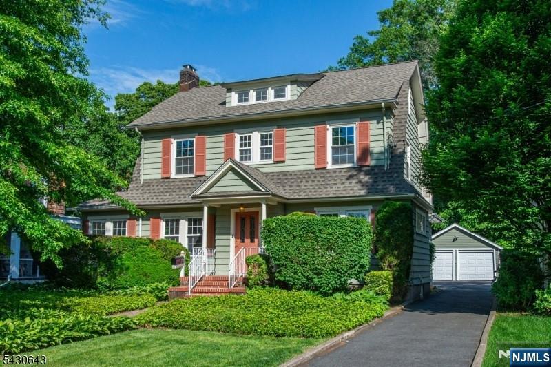 PRIME MONTCLAIR LOCATION! Just 4 blocks from Walnut Street Station & Midtown Direct train to NYC, this freshly painted quintessential center hall colonial is full of charm offering versatile living & potential! Formal living & dining rooms, newer eat-in kitchen w/ modern finishes & ample cabinetry, half bath, sunroom, as well as a jaw dropping 1st flr primary suite (w/ sizable full bath & walk-in closet, currently used as expansive fam room ideal for day to day living or entertaining). Upstairs features 3 bright bedrooms, vintage full bath + stairs to a sprawling attic perfect for storage/future expansion. Enormous finished basement offers laundry/storage/utilities/full bath + flexibility for home gym/office/rec room/den/play space. 2-car garage, long driveway, mature plantings, paver patio, lush yard. Truly a commuter's dream just waiting for your design eye! Easy access to shops/eateries/parks/magnet schools near Walnut Street & Watchung Plaza - enjoy all this town has to offer!