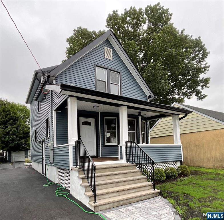 Completely renovated from top to bottom, this stunning 3-bedroom, 2.5-bath home offers the perfect blend of modern finishes and quality craftsmanship. Situated on an oversized 34 x 150 lot, every detail has been thoughtfully updated, including brand-new electrical, plumbing, roof, siding, kitchen, and bathrooms. Taken down to the studs and completely rebuilt, this home provides the quality and peace of mind of modern construction. Inside, you'll find beautiful hardwood flooring throughout, a bright open floor plan, and a beautifully designed kitchen with contemporary finishes. A convenient first-floor laundry room adds everyday functionality, while the spacious bedrooms and tastefully remodeled bathrooms complete the main living areas. The fully finished basement offers exceptional additional living space and features a full bathroom, making it ideal for a recreation room, home office, gym, or guest suite. Additional highlights include two-zone central air conditioning, two-zone forced hot air gas heat, a detached one-car garage, and a welcoming open front porch perfect for relaxing outdoors. Annual property taxes are $9,594. This truly move-in-ready home combines timeless charm with today's modern amenities and is conveniently located near shopping, dining, schools, parks, and transportation. Don't miss this exceptional opportunity!