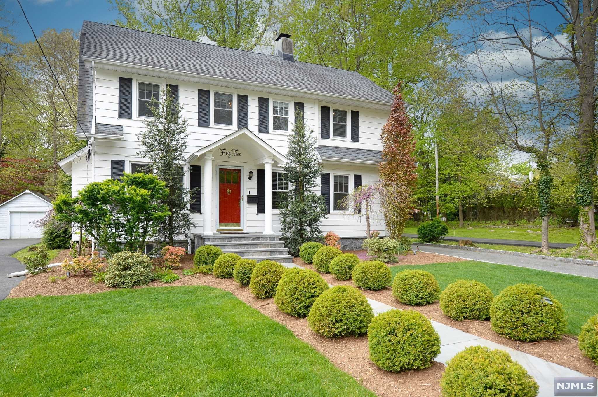 This Allendale Colonial Has Everything You've Been Looking For. Located Only A Short Walk From Town & Nyc Bus & Train. The Charm Begins With The Curb Appeal, Beautiful Landscaping & Architectural Details. Entering The Home, You're Greeted By The Living Room Complete W/ Brick Fireplace. Continuing Into The Family Room, 3 Walls Of Windows Pour In The Natural Light, The Space Can Also Serve As A Private Office Concealed By Glass Doors With A Powder Room Nearby. The Dining Room Is Spacious W/ Elegant Molding & Beautiful Built-Ins. The Kitchen Is Newly Updated Complete With S/S Appliances, Ample Cabinet Space & Quartz Counters. From There You Can Access The Deck & Large Rear Yard. The Master Bedroom, Full Bath And 3 Additional Bedrooms Make Up The 2nd Floor. The Basement Is Full And Unfinished W/ Laundry & Storage Space. Additional Highlights: Detached Garage, Bluestone Walkways, Inground Sprinklers, Many Interior Upgrades. This One Won't Last, A Must See!!