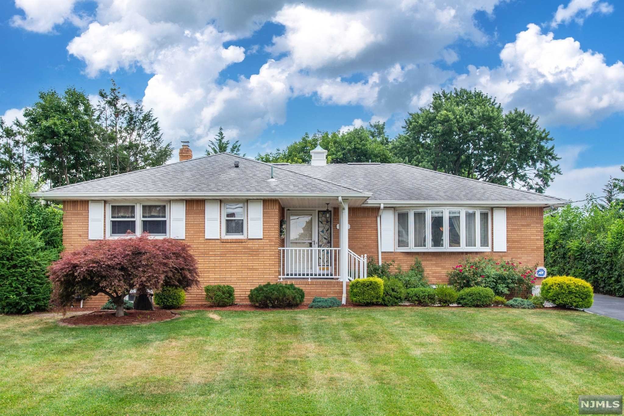 Beautiful, move-in-ready, cozy Home! Nice curb appeal! This Ranch style property features an open porch so you can relax on those summer afternoons, a welcoming entry foyer w/ a big size coat closet, that leads you to a large LR w/ a Bay Window that brings in a lot of natural light, a FDR, an EIK, a MBDR w/ a MBATH, and a 2nd nice size BDR w/ another FBATH. The Family Room w/ SGD that leads you to a park-like view fenced-in backyard, ideal spot to entertain friends and create wonderful memories year-round. A full finished W/O BSMT contributes w/ additional living space w/ an office space, a kitchenette, a wet bar, a great/ exercise/ family rm/ entertaining rm (you name it), a laundry area, a utility area, & a workshop area. The oversized detached garage has a capacity for 2 cars, plus a long driveway for more convenient off-street parking. Updates: Roof has less than 10 years, HWH replaced 2015. Close to major Highways, Schools, Shopping CTRS. This Home is ideal for NYC commuters!