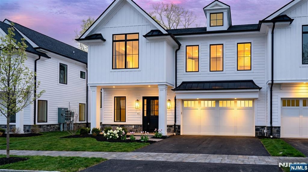 Experience elevated living in Rockleigh's first-ever luxury townhome community, offering a rare opportunity to own new construction in one of Bergen County's most exclusive and tightly held enclaves. Long known for its privacy and limited housing inventory, Rockleigh now welcomes discerning buyers seeking the prestige of a Rockleigh address paired with modern luxury living. This newly built, high-end residence showcases refined finishes and thoughtful design throughout, featuring an open-concept layout ideal for both everyday living and entertaining. The gourmet kitchen offers sleek cabinetry, premium countertops, and top-tier appliances, flowing seamlessly into bright living and dining areas. A private in-unit elevator provides convenient access to the second floor, enhancing both comfort and accessibility. Spacious bedrooms offer comfort and privacy, including a serene primary suite with a spa-like bath. Additional highlights include wide-plank flooring, contemporary lighting, custom millwork, in-unit laundry, ample storage, and superior quality construction throughout. A selection of premium upgrades and customization options are available, allowing buyers to tailor finishes and features to their personal style. Conveniently located near shopping, dining, parks, and major roadways, this exceptional 55+ community offering blends exclusivity, craftsmanship, and lifestyle - an unmatched opportunity to finally own in Rockleigh.
