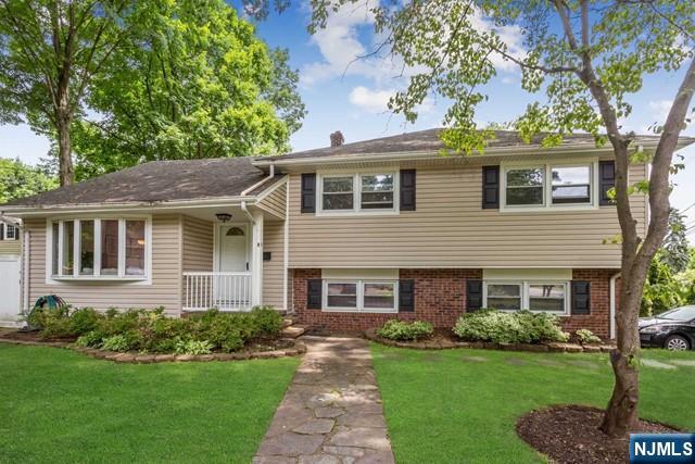 Fantastic 3 Br, 3Bth, 2-car attached garage S/L home on a very desirable location. Close to all top-rated schools, parks, NYC buses, etc. Hardwood floors throughout, Modern kitchen, Hallway skylight, Living room w/Baywindow, Primary Br/ Full Bath & WIC. Finished Basement with full bath. Perfect executive rental opportunity.