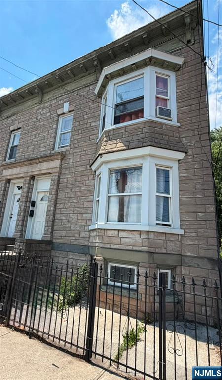 Perfect investment opportunity in the heart of Newark City! This versatile property features two well-designed units with separate entrances. The first floor offers 4 bedrooms, a living room, an eat-in kitchen, and a full bath. The second floor offers 5 bedrooms, a living room, an eat-in kitchen, and a full bath. It is an excellent option for owner-occupants, investors, or those seeking flexible living arrangements.Conveniently situated just minutes from NYC-bound transportation and major highways, this property offers exceptional convenience. Whether you're looking to expand your portfolio or secure an income-producing property, this Newark City gem is one you won't want to miss.