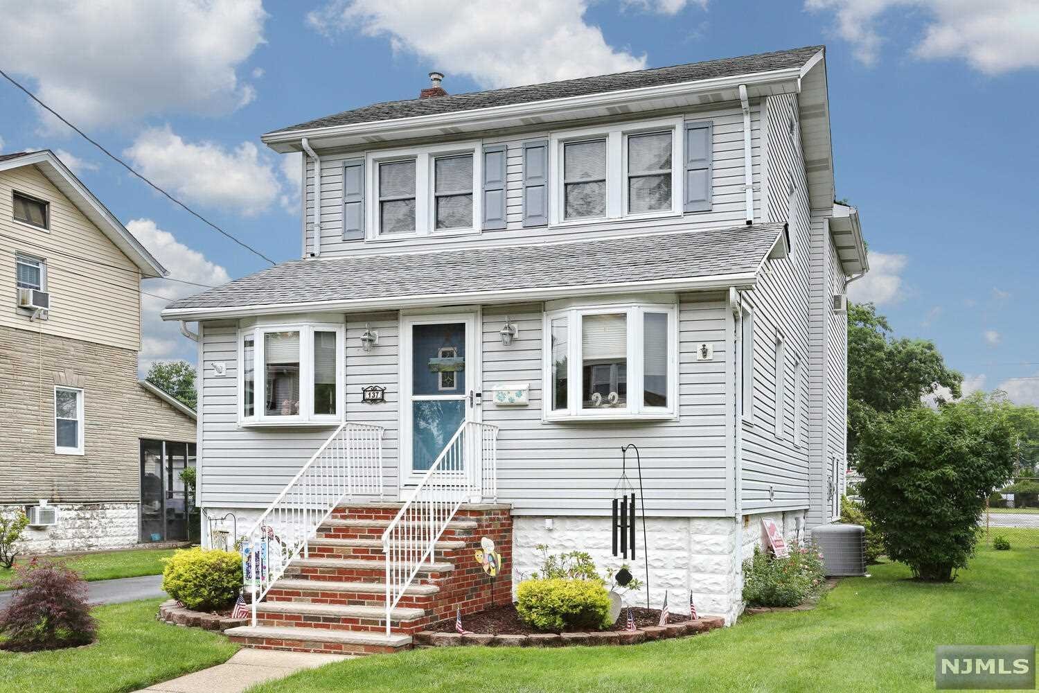Wonderfully kept and maintained expanded Colonial with four bedrooms and two full bathrooms. First floor has a great flow with nice size living room, large formal dinning room, full bath and a fantastic updated eat-in kitchen with island and pantry closet. Second floor has four nice bedrooms and a full bathroom. Family room/den located on ground floor with access out to the backyard, complete with a beautiful landscape and composite deck, perfect for family barbeques. Basement is full but unfinished with tons of storage. Central air, irrigation system, security system and an oversized garage are just a few more reasons to come take a look at this home. Walking distance to Jefferson Elementary School and NYC transportation. Come and see before it's gone.