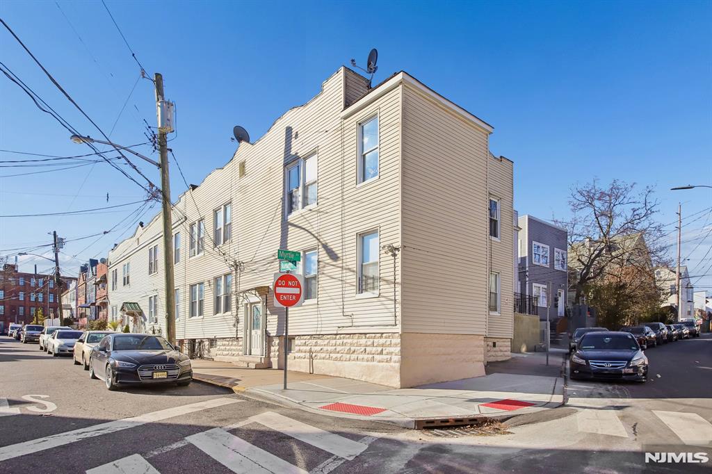 Welcome to Jersey City, one of Hudson Countyâ€™s most sought-after and rapidly growing communities. This well-maintained corner 4-family property presents an exceptional opportunity for both investors and owner-occupants; live in one unit while generating rental income from the others or add a strong cash-flowing asset to your investment portfolio. The property features separate utilities, a partially finished basement with additional income-producing potential, and much more. Ideally situated near public transportation, including the light rail and bus lines, with convenient access to major highways and just minutes from restaurants, schools, parks, shopping, and other everyday conveniences. Donâ€™t miss this outstanding investment opportunityâ€”schedule your private showing today, as this property will not last long! (Front entrance located at 31 Randolph Avenue.)