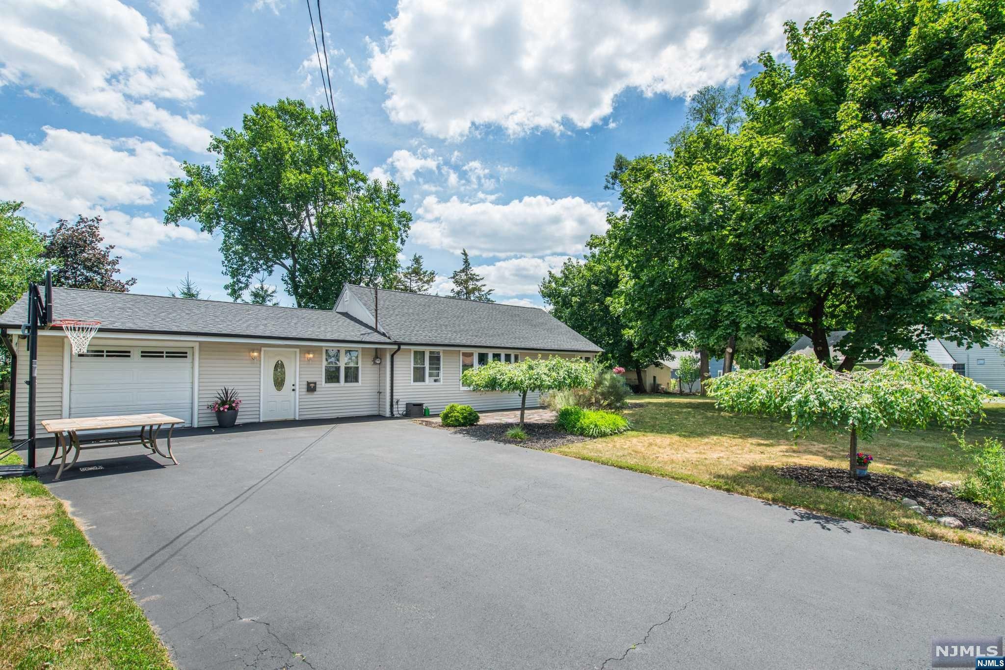 Welcome to this charming 3-bedroom, 1-bath ranch, this home boasts a beautifully landscaped yard and a delightful paver patio, perfect for outdoor relaxation and entertaining. With a new roof installed in 2021 and a fresh paver patio added in 2022, this property is move-in ready. The septic system was also replaced in 2015, ensuring peace of mind for years to come. Enjoy the convenience of a 1-car garage and the close proximity to local parks, popular restaurants, and Trader Joe's. This home offers the perfect blend of comfort, convenience, and charm. Don't miss the opportunity to make it yours!