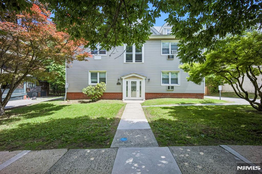 Outstanding income-producing property in the heart of Montclair's newly redeveloped business district. Close to NYC bus/train, restaurants & shopping. 6 total units - 2 units with 2BRs & 2 full baths; 2 units with 2 BRs & 1 full bath; and 2 units with 1 BR & 1 bath. 4 garage bays. Ample parking. Unfinished basement with laundry hook ups.