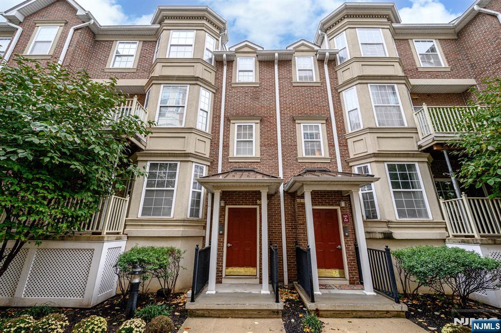River Park at Harrison premieres this lovely 2 Bed 2 Bath Turn-Key Townhome with Primary Suite in a prime commuter location, sure to impress! Beautifully maintained inside and out with plenty of amenities to indulge, enjoy maintenance-free luxurious living with modern conveniences. The main level features a spacious living room with vinyl flooring that extends throughout, recessed lighting, and french slider to your own private balcony. Upgraded Eat-in-Kitchen offers sleek SS appliances, granite counters, ample cabinet storage, tiled flooring and dinette space. Accessible first floor bedroom has its own access to the main full bath with walk-in stall shower for added convenience. Upstairs, find the large Primary Suite with plush carpet and private luxe ensuite bath. In-unit laundry, too! Central air/forced heat & addtl smart features inc a bath fan with bluetooth speaker, LED light with night light, Ecobee smart thermostat, and garage door opener via smartphone. Amenities at an addtl charge inc a clubhouse with serene river views, heated outdoor pool with terrace, exercise facilities, game room with billiards, shuffleboard, Wi-Fi private business lounge and more! All in close proximity to public transit, with free shuttle to the Harrison Path, major roads, shopping, dining, and more! Why rent when you can own? Come & see TODAY!