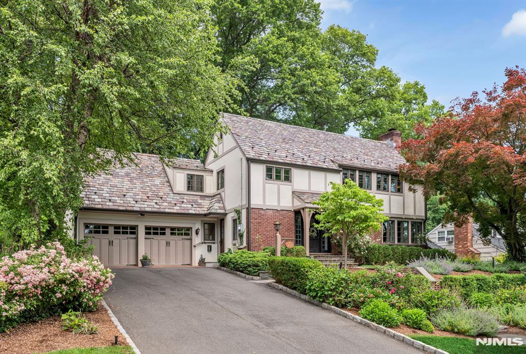 Rare opportunity to own this picturesque classic Cheel colonial in sought-after Ho-Ho-Kus. This classic home, with its slate roof and stunning curb appeal sits prominently in prime location. Timeless charm & updates throughout. A lovely entry opens to an inviting living rm with a wood-burning FP & a wall of windows that fill the space w/ natural light. A beautifully renovated kitchen (2018) is the heart of the home, offering a large quartz center island, farmhouse sink, & high end appliances. The adjacent family rm showcases a custom ceiling, gas FP w/ built-ins, & sets of French doors leading to the expansive patio. The exceptional rear property is a true highlight, boasting a flat, level, park-like setting surrounded by lush mature landscaping. Mudrm, powder rm, & 2-car attached garage complete the main level. The primary suite offers 2 closets & a renovated bath (2018) w/ oversized marble shower, marble floor, & double vanity. Three additional bedrooms including a junior suite w/ private bath, and a 3rd full bath. A rear staircase adds convenience & character. The finished lower level provides a spacious recreation room, laundry area, & abundant storage w/ built-ins. Addâ€™l highlights include hardwood floors throughout, all new windows (2018), two-zone forced-air heat & central air, slate roof, & water purification system. A rare opportunity to own a beautifully updated Cheelcroft Colonial with exceptional outdoor space in one of Bergen County's most desirable communities