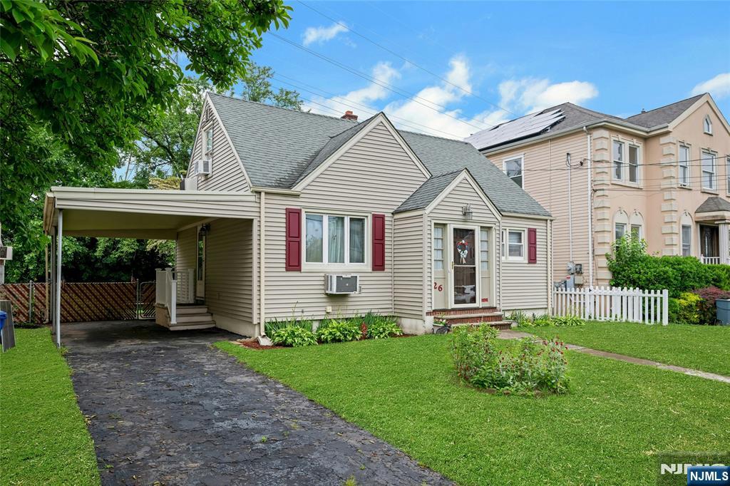Bright & Sunny Belleville Cape. Enjoy cooking in the large eat in kitchen, step through sliders on to the deck, over look the lush green backyard both wonderful for entertaining & summer activities. Interior offers hardwood floors, updated bathroom, 2 bedrooms 1st floor, primary bedroom 2nd floor with additional room currently being used as an office could be a nursery.