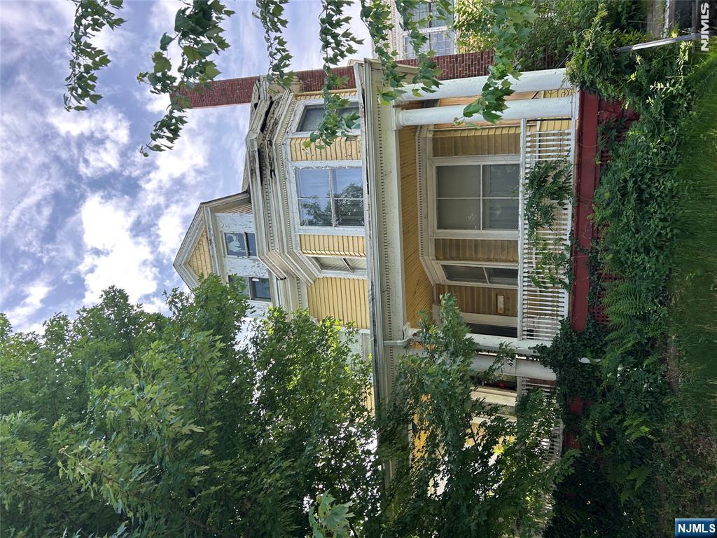 This large, charming older home at 624 14 Ave in Paterson, NJ offers incredible potential for the right buyer or investor willing to take on a major rehab. Featuring generous square footage, original architectural details, and a spacious layout, this property awaits a complete renovation to restore its former beauty. With solid bones and classic character, it's an ideal canvas to create a stunning custom residence or profitable rental. Located in a convenient neighborhood close to local amenities, this home is a rare opportunity for those seeking a rewarding rehab project. Bring your vision and expertise to unlock the full value of this diamond in the rough. Sold as-is. Don't miss out!