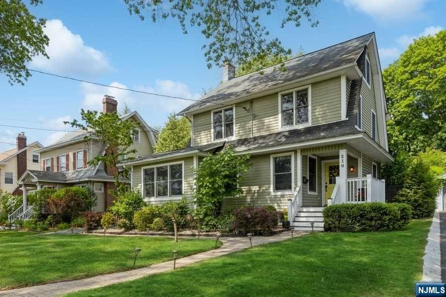 This classic, stylish Colonial, set in the heart of Ridgewood, has the hallmarks you look for in a home! No need for a car, everything in town is at your fingertips. Shopping, dining, train to NYC, Graydon pool and the much celebrated library are minutes away. The traditional architecture seamlessly blends a flexible floor-plan with just the right amount of privacy. Four levels of living space are enhanced by subtle accent colors and gleaming hardwood floors. Updated windows throughout allow for stunning light year-round. Simplify your routine, there is first floor laundry by the mudroom. Cozy up by the fireplace or work from home in the Sun Room. Both Kitchen and Dining Room have great views of the gorgeous yard. Upstairs you have three spacious bedrooms and hall bath, the third floor has a fourth bedroom and powder room. The outdoor space really takes things up a notch! The expansive property boasts a pizza oven, deck for entertaining and serene Koi pond. Make it year round fun!
