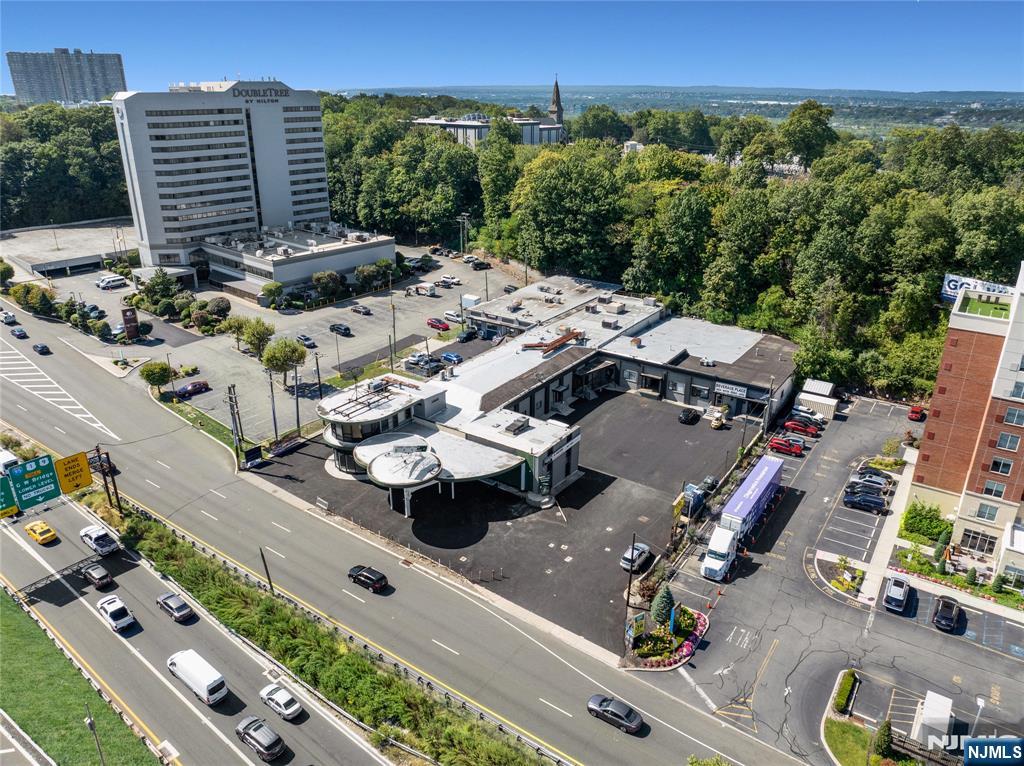 Rare warehouse/flex/industrial building offering 2,540sf-19,355sf. Ceiling height ranges between 11ft-18ft depending on suite. On premise parking. Loading dock/area. Triple net lease structure.
