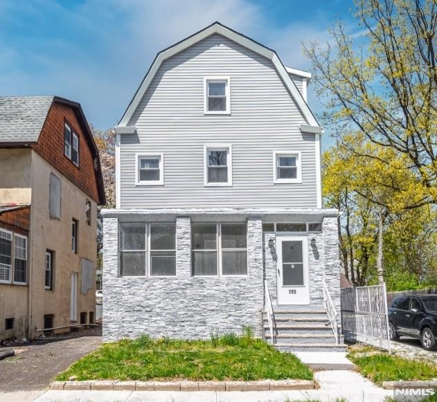 Beautifully renovated two-family property featuring 2 units, each offering 2 spacious bedrooms and 2 full bathrooms. Ideally located steps from Seton Hall University and just minutes from the vibrant downtown South Orange train station with direct NYC access. Each unit features a modern layout, large primary suite with private full bath, brand-new stainless steel appliances, dedicated washer and dryer hookups, and brand-new central heat and AC. Off-street parking is included, with additional parking at the back for up to 6 cars. Perfect for both investors and owner-occupants looking to live in one unit while generating rental income from the other. Enjoy all that South Orange has to offer including restaurants, shopping, parks, and a strong community atmosphere in one of Essex County's most commuter-friendly locations. *Photos taken prior to tenants moving in