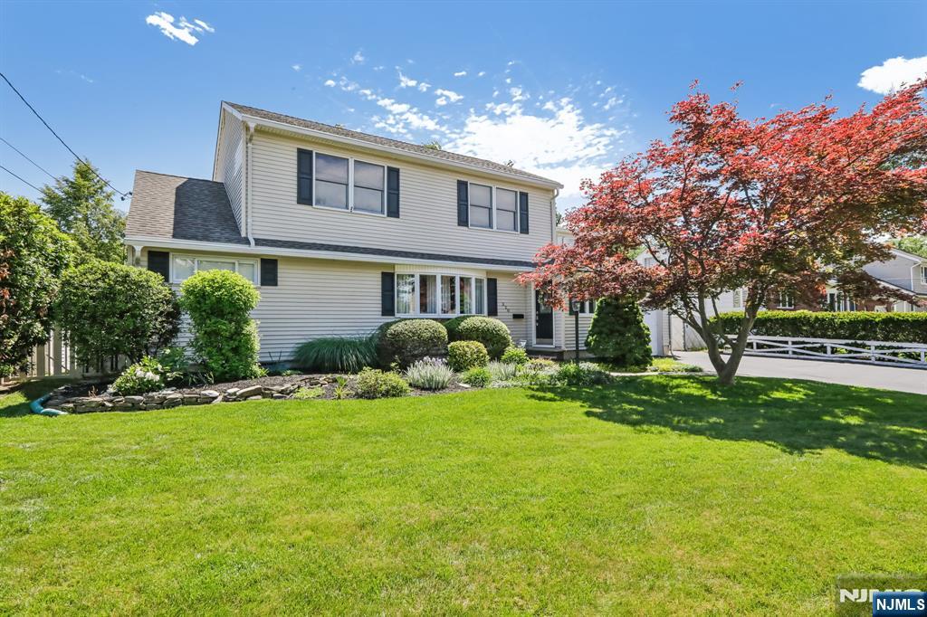 Welcome to this beautifully maintained home nestled on a quiet, tree-lined street in one of New Milfordâ€™s most desirable neighborhoods, just moments from the Oradell border. Situated on a wider, low-traffic street with a peaceful residential feel, this property offers the perfect blend of privacy, comfort, and convenience. Designed for todayâ€™s lifestyle, the home features a versatile floor plan highlighted by two primary suites. The first-floor primary bedroom offers ease and accessibility, while the second-floor en-suite provides exceptional flexibility with its own private bedroom, full bath, kitchenette area, and generous closet space, ideal for multi-generational living, extended guests, or a private retreat. Step outside and discover your own backyard oasis. Enjoy summer days around the 16â€™ x 32â€™ in-ground pool, entertain on the custom 15â€™ x 30â€™ sealed deck, or relax in the cabana overlooking the private, level yard. Additional outdoor features include a storage shed, Newly sealed driveway, underground sprinkler system, and gutter protection system for low-maintenance living. Additional highlights include central air conditioning, four-zone gas baseboard heat, abundant storage throughout, and a full-house generator providing peace of mind year-round. Combining flexible living space, exceptional outdoor amenities, and a sought-after neighborhood setting, this move-in ready home offers a rare opportunity to enjoy the best of Bergen County living.