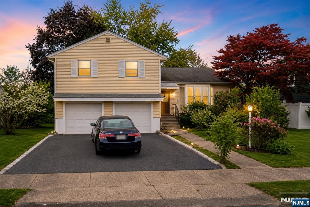 Welcome to this beautifully maintained 3-bedroom, 2.5-bath home located on a quiet residential street in the desirable town of Fair Lawn. Surrounded by colorful, mature landscaping and highlighted by a budding fig tree, this charming home offers the perfect balance of comfort, convenience, and neighborhood appeal. Ideal for families and commuters alike, the home is within walking distance to schools, restaurants, and a pharmacy, while also being just minutes from the train station with convenient access to NYC transportation. Enjoy a spacious backyard perfect for entertaining, relaxing in the sunshine, or playing with family and friends. Inside, the home features beautiful kitchen finishes, warm and inviting living spaces, and an unfinished basement offering endless possibilities. A wonderful opportunity to own a charming home in one of Bergen Countyâ€™s most sought-after communities.