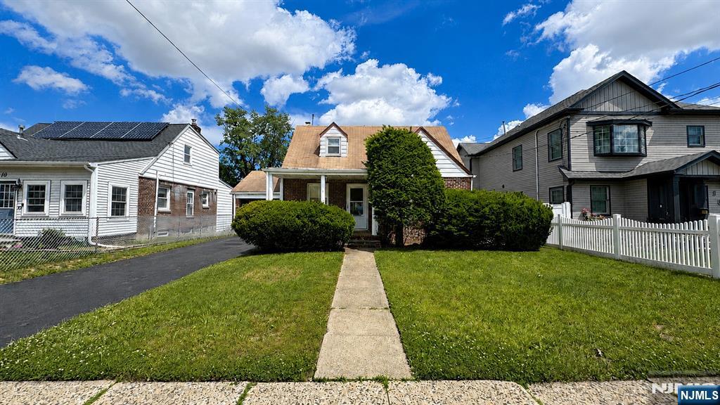 Welcome to this Cape Cod style home set in a residential neighborhood. This home offers a wonderful opportunity for buyers looking to bring their vision to life and create a space that reflects their own style. Featuring a practical layout, a 1-car garage, and classic charm, the property provides plenty of potential. Located just moments from nearby NJ Transit bus service, with convenient access to local shopping, parks, and major highways. Whether you are an owner-occupant, investor, or someone seeking a home to personalize over time, this property is full of possibility in a convenient Bergen County location.