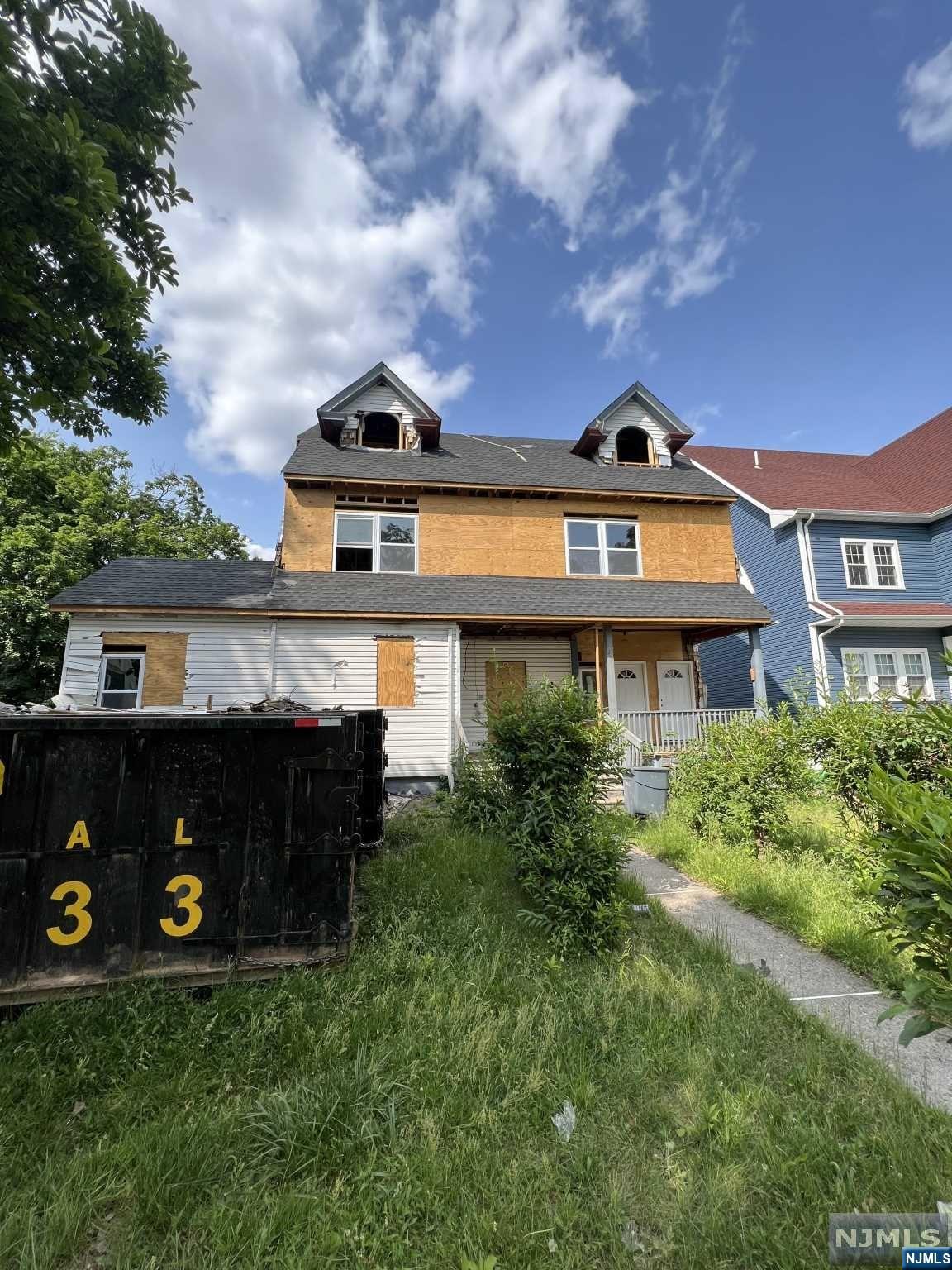Calling all savy investors or owner occupiers ! This massive 2 family home on a large lot in literally the best section of booming East Orange has been completely gutted to the studs for the next owner. With all new framing, new roof and most the electrical and plumbing complete this property has tremendous upside. This is a great project for investors to make a profit or perfect for the owner occupier who wants to have instant equity and customize their own home. CASH/HARD MONEY OR 203k loans welcomed. Schedule now !