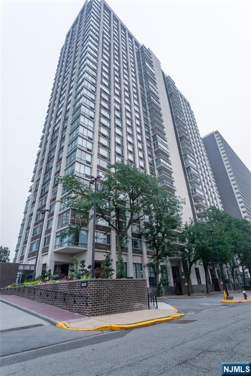Enjoy elegant high-floor living in this fully renovated residence at Century Tower in Fort Lee. This move-in ready home offers approximately 1,299 square feet of finished living space designed for comfort and modern style. The open-concept layout features a contemporary kitchenâ€”complete with brand new appliancesâ€”that flows into a spacious living and dining area, ideal for both entertaining and daily relaxation. Beautiful new flooring throughout. Large walls of windows fill the home with natural light and showcase unobstructed mountain, city, and sunset views. The primary suite offers a private layout with extensive closet space, and a new full en-suite bath. Both the new primary bath and the new powder room feature contemporary Porcelanosa vanities and tiling. Century Tower is a full-service building in downtown Fort Lee. Residents have access to a suite of amenities, including a 24-hour doorman, concierge services, an outdoor swimming pool, a fitness center, and on-site parking. Located in the center of town, the building is steps away from local shopping, dining, and NYC transportation. Move-in condition!