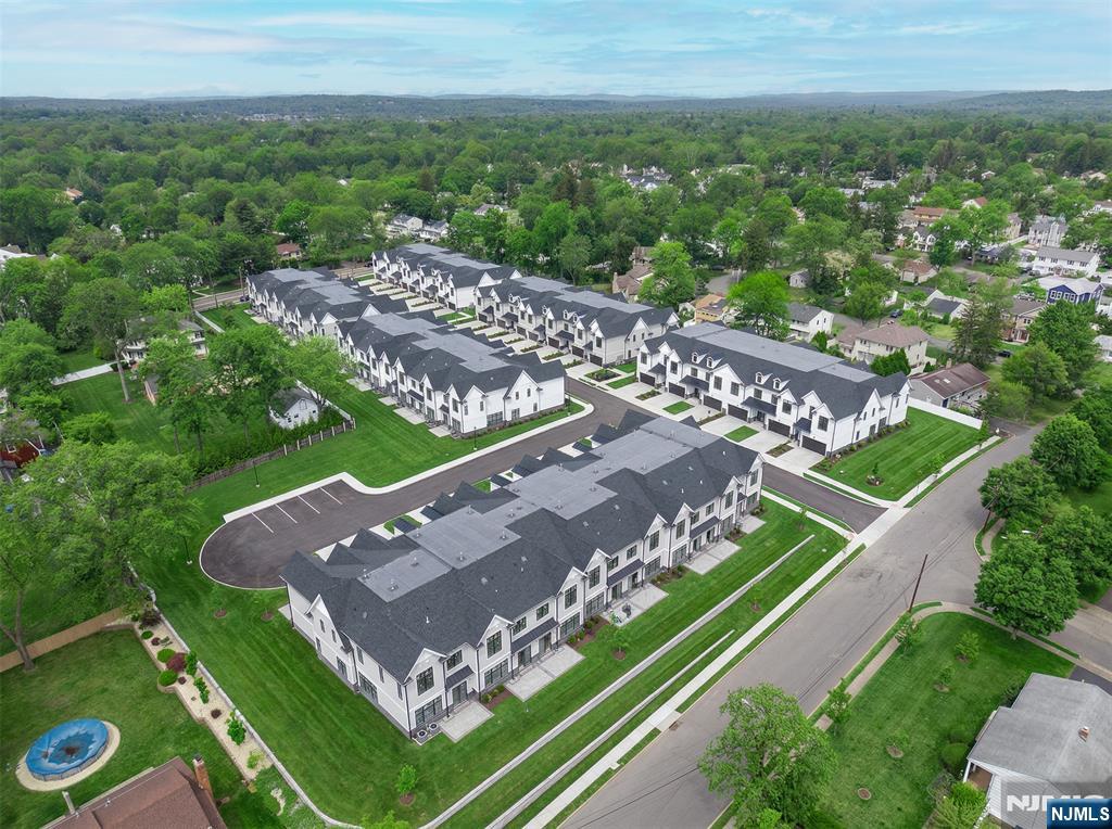 Introducing Victoria Estates in Paramus, a collection of 42 luxury townhomes. This brand new construction community is truly one of a kind, built by Rock Solid Builders, known for their impeccable portfolio. Experience a lifestyle of unparalleled sophistication where every detail reflects superior craftsmanship. Each residence offers over 5,000 sq ft of living space, featuring a two car garage and three levels of luxury living. The first floor showcases a gourmet kitchen with a 10 foot quartz waterfall island, Sub Zero and Wolf appliances, and custom cabinetry, flowing seamlessly into an open concept living area with a gas fireplace and custom built ins. Upstairs, the primary suite offers a spa inspired en suite bathroom and two oversized walk in closets with custom shelving, along with two additional spacious bedrooms, a full bathroom, and a large laundry room. The fully finished basement includes a recreation room, gym, and full bathroom. Ideally located just minutes from major highways, schools, and shopping. Experience the extraordinary. Model Home Unit 31 Feldman Ct.