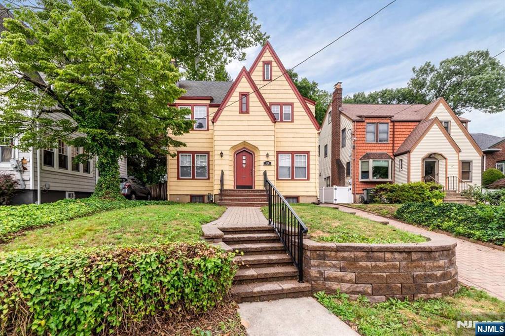 Welcome to this charming 3-bedroom, 1.5-bath home, ideally located in the highly desirable town of Rutherford. Rich in character, this home showcases the beautiful original woodwork and timeless craftsmanship that Rutherford homes are known for. The first floor features a welcoming living room with a cozy fireplace and beautiful hardwood floors, along with a den, formal dining room, kitchen, and family roomâ€”perfect for everyday living and entertaining. Upstairs, you'll find three generously sized bedrooms, a full bathroom, and a walk-up unfinished attic offering excellent potential for future expansion or additional living space. The finished basement includes a family room, laundry area, and a convenient half bath, providing added flexibility for recreation, a home office, or additional living space. Outside, enjoy a private backyard with ample room for entertaining, as well as a detached one-car garage.