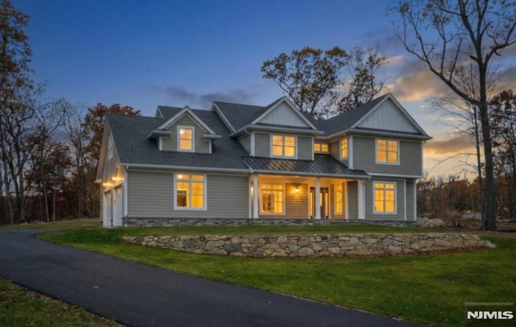 Welcome to Bristol Ridge, an enclave of luxury homes in prestigious Boonton Township. This one of a kind newly constructed gorgeous home combines modern elegance with exceptional craftsmanship. Boasting 5 bedrooms, 4.5 baths, formal DR and gourmet kitchen with porcelain countertops, huge island for entertaining, full panel glass sliders leading to the covered veranda, a large gathering room with gas fireplace, perfect for large gatherings, a butler's pantry w/wine fridge, pantry, formal dining room, 1st floor bedroom/office with walk in closet and full bath, 4 additional bedrooms on the 2nd floor w/spectacular NYC views on 2.84 acres of serene natural beauty. This home also features a full unfinished basement with endless possibilities. Top rated school system, closed to parks and NYC transportation, this masterpiece is ready for its owners to move in and enjoy! Owner will consider financing with 25% down. Owner will put in comparable pool to photo in listing for $2,495,000.