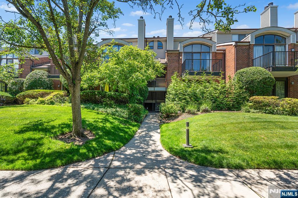 Welcome to a beautifully maintained townhome located in the highly sought-after Glen Pointe community. This spacious residence offers 3 bedrooms and 2.5 baths, combining comfort, convenience, and low-maintenance living. Enjoy the ease of a private elevator, providing seamless access from the garage level.The thoughtfully designed layout features generous living spaces, abundant natural light, and a functional flow ideal for modern lifestyles. The spacious living room features a wood burning fireplace that leads to a balcony to enjoy the seasons. The large Primary suite features a spa bath and walk in closets. Residents of Glen Pointe benefit from exceptional amenities, including 24-hour security, a community pool, and tennis courts, creating a resort-like atmosphere right at home. Ideally situated near major highways, shopping, dining, and just minutes from New York City, this home offers the perfect blend of suburban tranquility and urban accessibility. A rare opportunity to enjoy upscale living in one of Teaneckâ€™s premier communities.