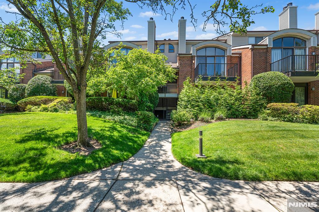 Welcome to a beautifully maintained townhome located in the highly sought-after Glen Pointe community. This spacious residence offers 3 bedrooms and 2.5 baths, combining comfort, convenience, and low-maintenance living. Enjoy the ease of a private elevator, providing seamless access from the garage level.The thoughtfully designed layout features generous living spaces, abundant natural light, and a functional flow ideal for modern lifestyles. The spacious living room features a wood burning fireplace that leads to a balcony to enjoy the seasons. The large Primary suite features a spa bath and walk in closets. Residents of Glen Pointe benefit from exceptional amenities, including 24-hour security, a community pool, and tennis courts, creating a resort-like atmosphere right at home. Ideally situated near major highways, shopping, dining, and just minutes from New York City, this home offers the perfect blend of suburban tranquility and urban accessibility. A rare opportunity to enjoy upscale living in one of Teaneckâ€™s premier communities.