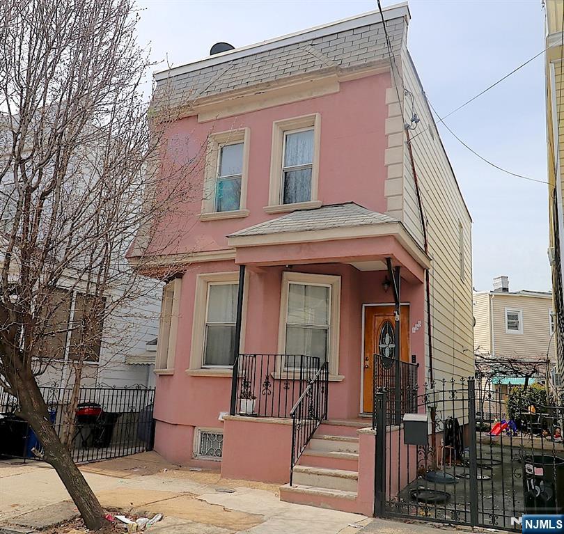 Welcome to 155â€“157 Brill Street! A rare investment or development opportunity awaits in Newark's highly desirable Ironbound neighborhood. Two single-family homes are being sold together on an oversized 50' x 100' irregular lot with R-3 zoning, offering exceptional flexibility for investors, developers, or owner-occupants. Both homes front Brill Street and feature garages, with the added convenience of rear-yard access from Christie Street. Additional highlights include a partially finished basement, separate utilities for each home, durable vinyl siding, a private driveway, a two-car garage, and additional rear parking. Whether you're looking to expand your investment portfolio, explore future development possibilities, or live in one home while generating rental income from the other, this unique property offers outstanding value and long-term potential. Don't miss this exceptional opportunity to own a versatile, income-producing property in one of Newark's most vibrant and rapidly growing communities, with convenient access to shopping, dining, major highways, Newark Penn Station, and an easy commute to New York City.