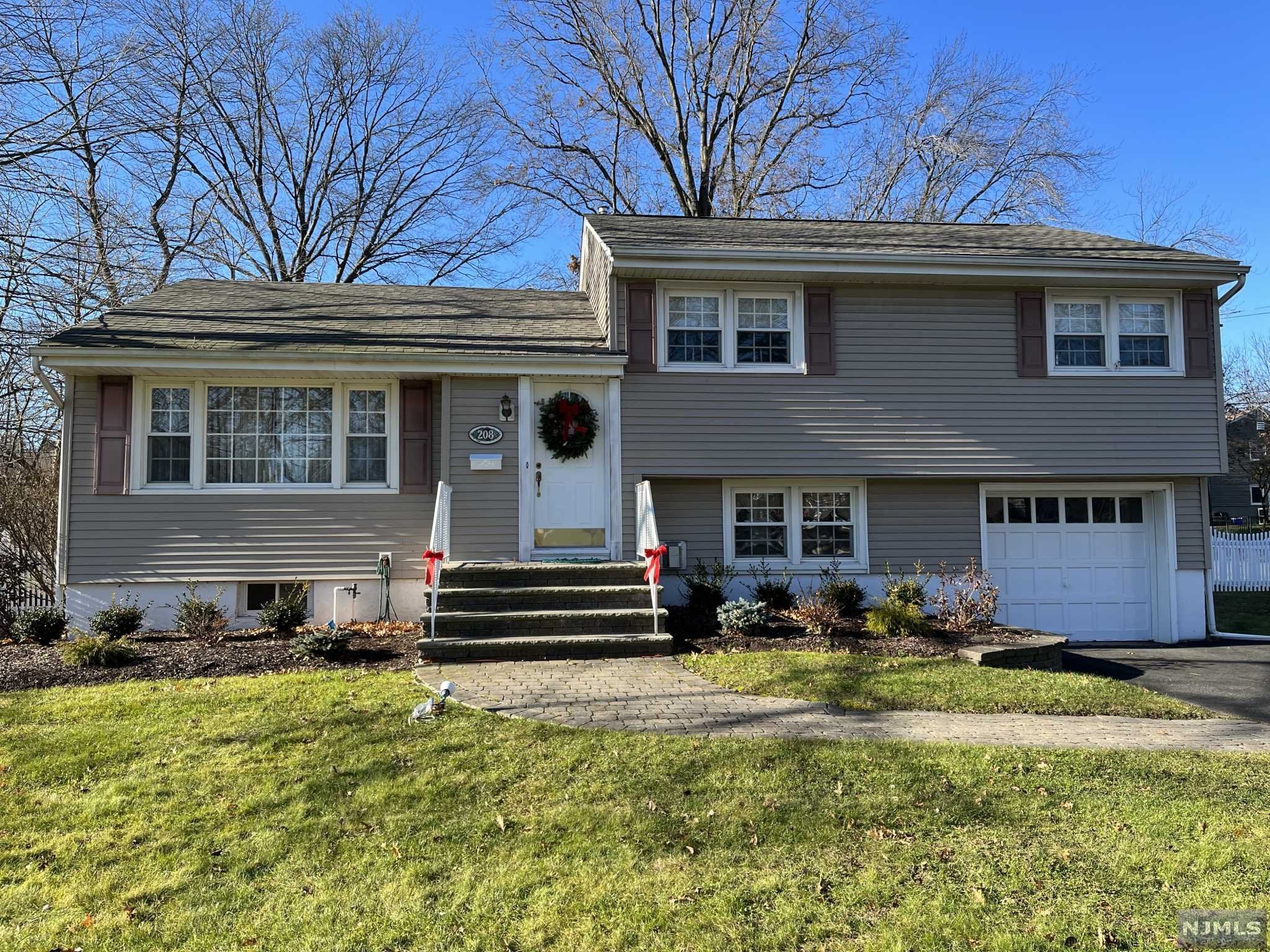 WELCOME HOME ! THIS HOME HAS BEEN METICULOUSLY MAINTAINED BY THE OWNERS. THE FIRST FLOOR HAS A LIVING ROOM, MEIK,FDR,SGD TO DECK. SECOND FLOOR HAS MASTER BED,MASTER BATH, 2 ADDITIONAL BEDROOMS AND A HALL BATH with Laundry Chute GRADE LEVEL HAS A FAMILY ROOM WITH GAS FIREPLACE, POWDER ROOM, LAUNDRY ROOM, ENTRANCE TO GARAGE. BASEMENT HAS A FINISHED REC ROOM AND LARGE STORAGE ROOM THERE IS A DECK OFF THE DINING ROOM,GENEROUS IN SIZE: 17'9 X 15'7. UNDERGROUND SPRINKLERS AND STORAGE SHED. SOME OF THE MORE RECENT IMPROVEMENTS: ROOF-2018, FURNACE -2018, WATER HEATER-2020, CENTRAL AIR-2019, OVEN-2018, LANDSCAPING-2021