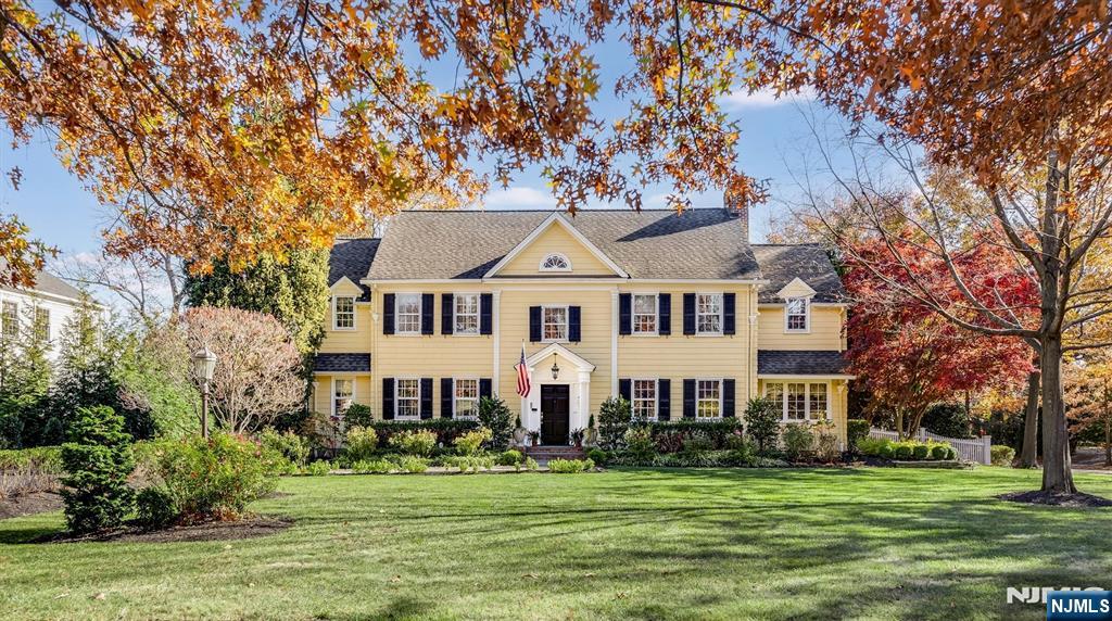 Presenting an iconic Glen Ridge 6 bedroom colonial and carriage house. The floorplan evokes a feeling of gracious warmth in this expansive yet livable home that's perfect for working, relaxing and entertaining. Highlights include: home theater, gym, mudroom, library, WFH office, wine bar, Carrara clad butler's pantry, large EIK w/ Sub-Zero/Wolf/Viking appliances with dual dishwashers, refrigeration and ovens, custom cabinetry and pantry, family room and a large ensuite primary with sitting area. Topped off with countless walk-in closets, 4 zone HVAC & back-up generator. Four sets of French doors lead to bluestone patio featuring outdoor bar w/built in BBQ, al fresco dining and sofa space, fenced yard and play home. There is a comfortable carriage house with kitchenette awaiting your guests. Situated in a prime location close to country club, bus, train and schools with the convenience of restaurants and shopping, this home defines turnkey elegance you won't want to miss it!